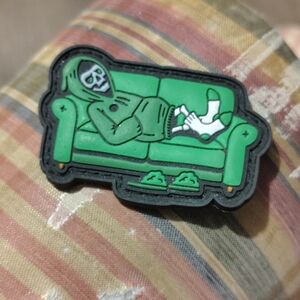 Green Skeleton Couch Enamel Pin